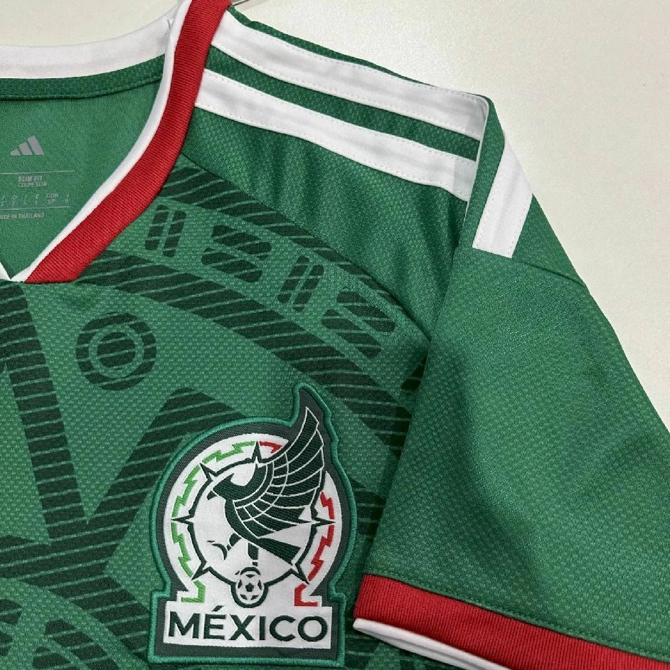 Green soccer jersey with Mexico logo and Adidas branding on a white background