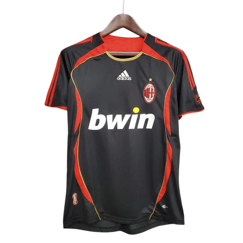 AC Milan Third Jersey 2006/07 front view in charcoal with red side panels, gold piping, AC Milan crest and Bwin sponsor