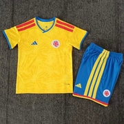 Adidas Colombia home kit 2026/27 kids set front view yellow jersey with blue shorts
