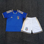 Adidas Italy home kit 2026/27 kids set front view blue jersey with white shorts
