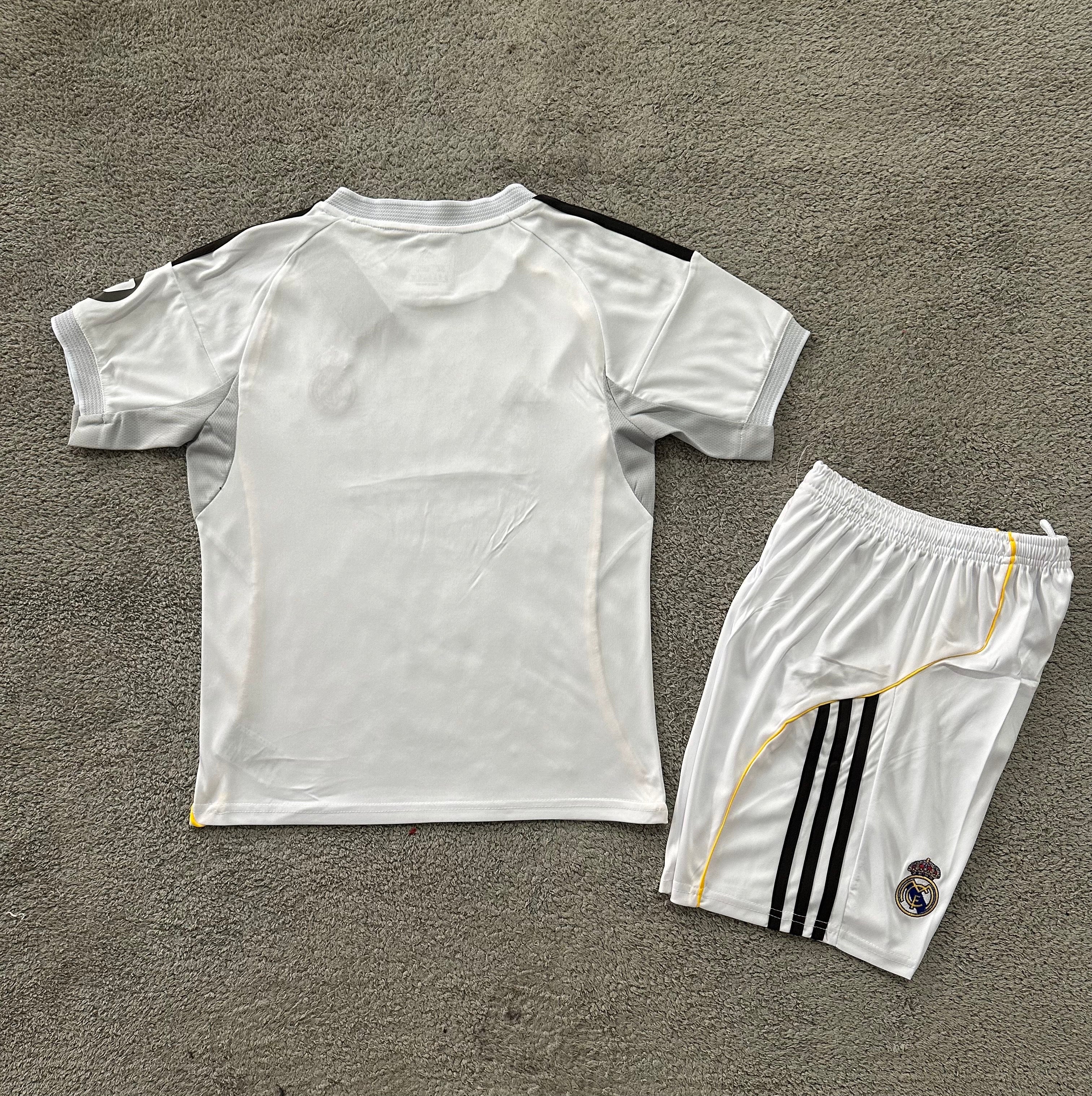 Adidas Real Madrid 2025/26 home youth kit back view white shirt and white shorts