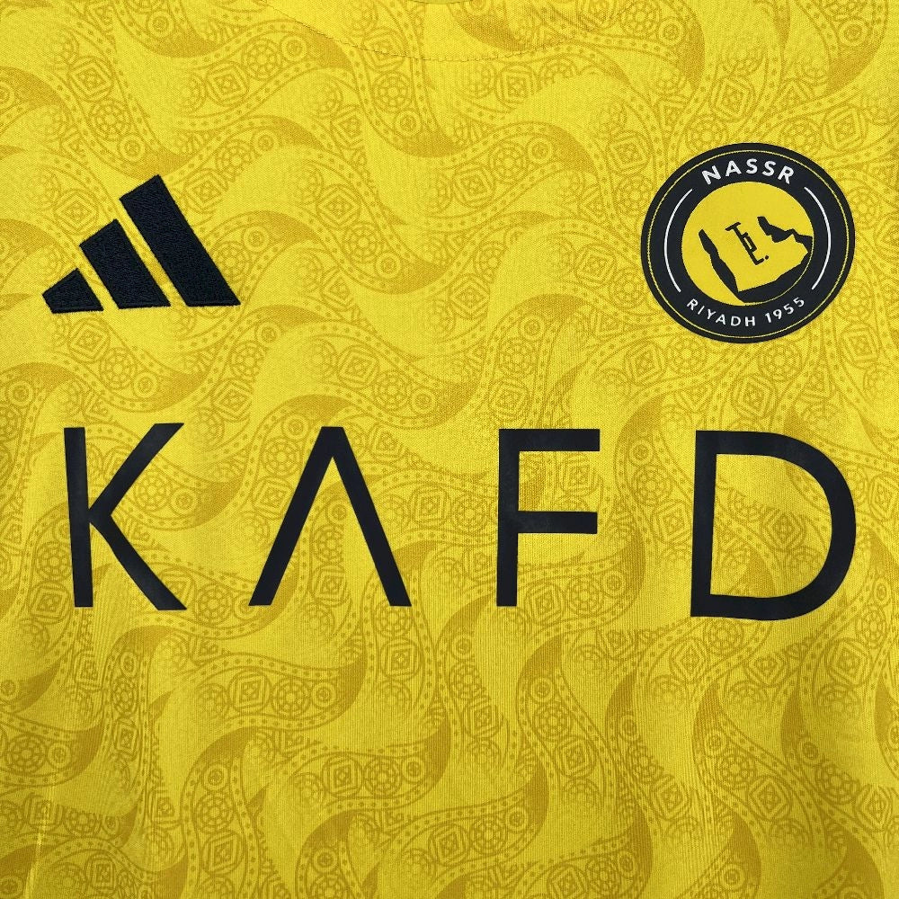 Al Nassr 2025/26 home jersey crest view yellow football shirt
