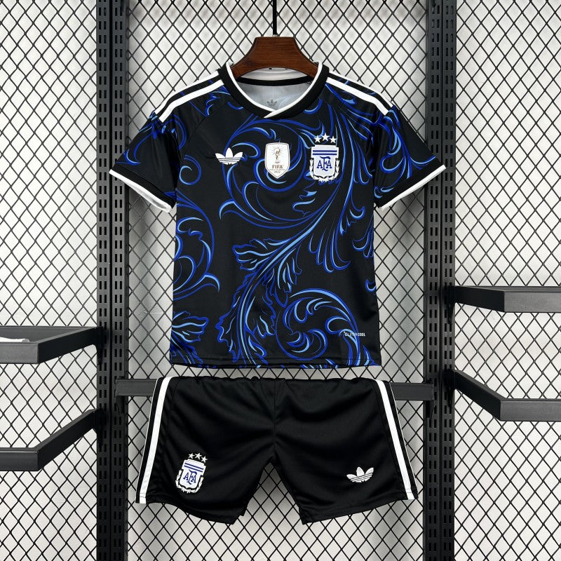 Argentina Away Jersey 2026 Kids Set front view with black shirt, electric blue swirling graphics, Argentina crest and matching black shorts