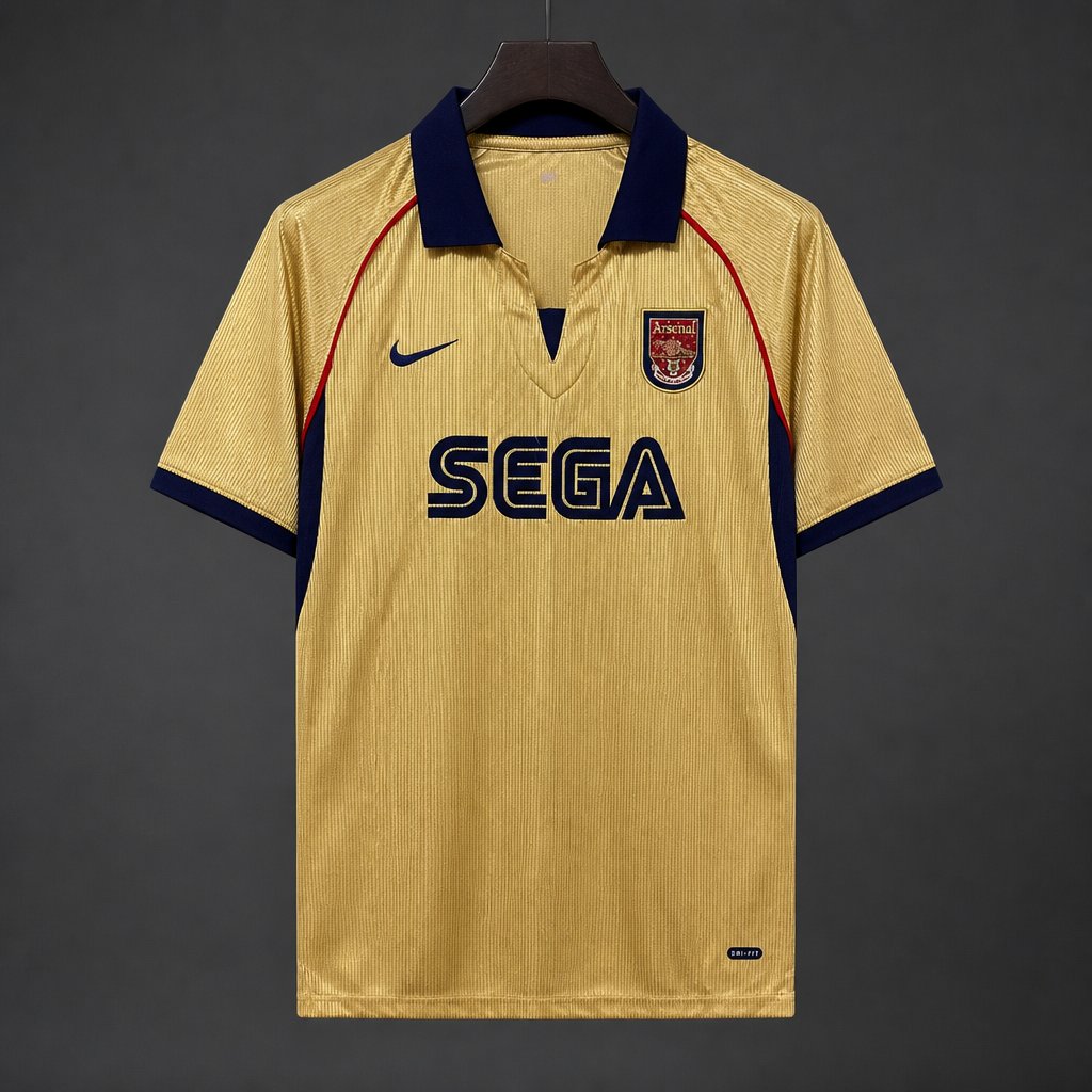 Arsenal Away Jersey 2001/02 front view in gold with navy collar, Arsenal crest and SEGA sponsor