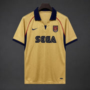 Arsenal Away Jersey 2001/02 front view in gold with navy collar, Arsenal crest and SEGA sponsor