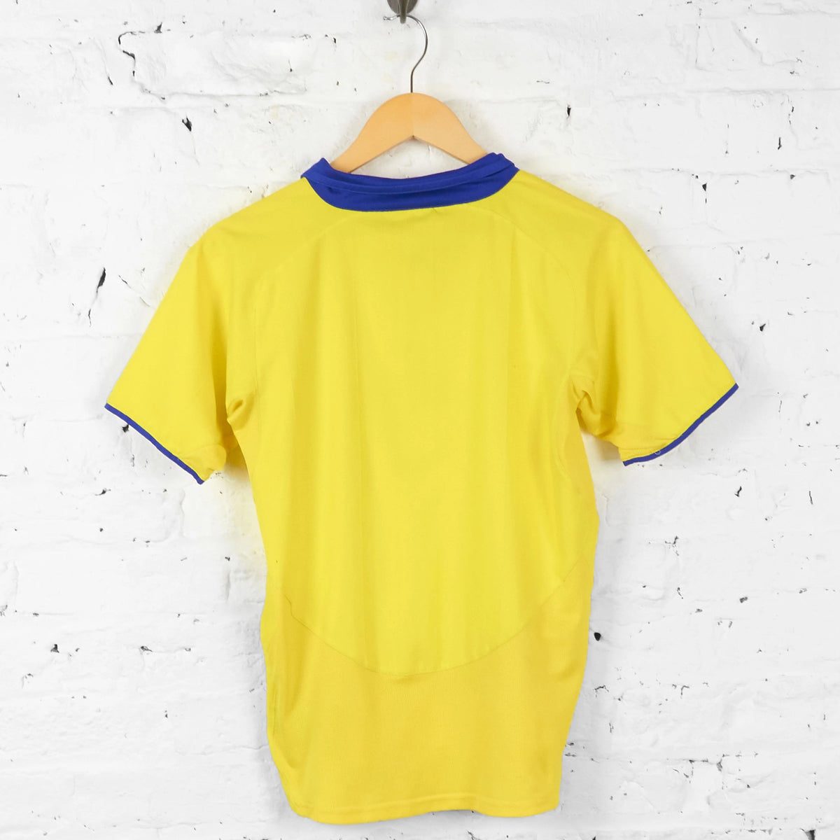 Arsenal Away Jersey 2003 back view in yellow with blue collar and sleeve trim
