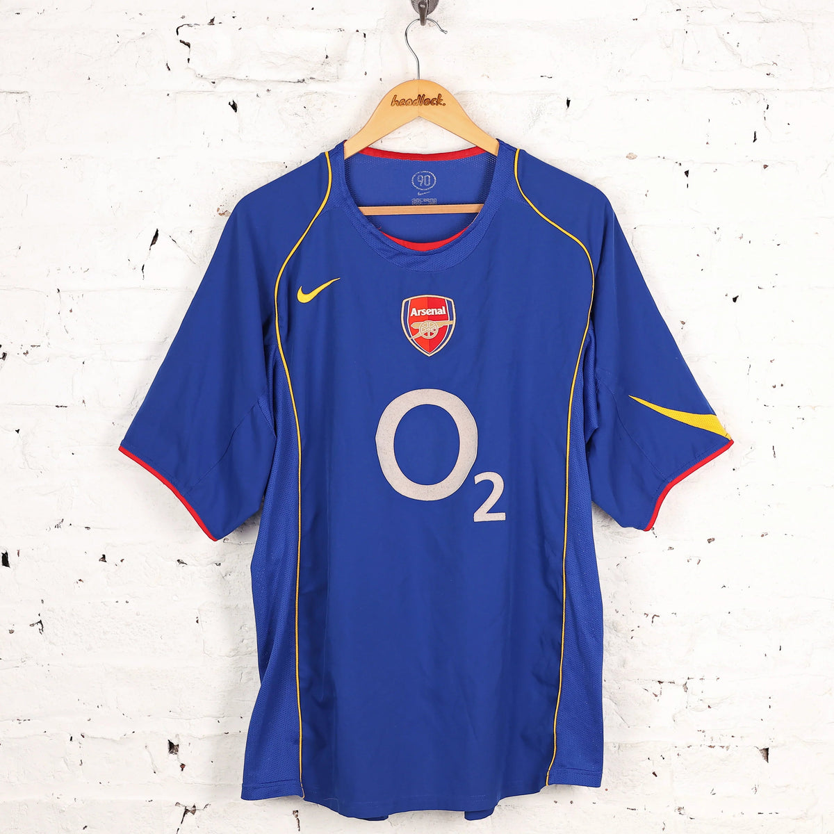 Arsenal Away Jersey 2004/05 front view in blue with O2 sponsor and Arsenal crest