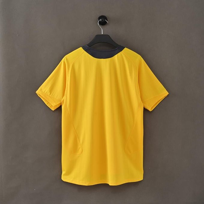 Arsenal Away Jersey 2005/06 back view in yellow with navy shoulder detailing