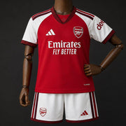 Arsenal Home Jersey 2026 Kids Set front view with red jersey and white shorts