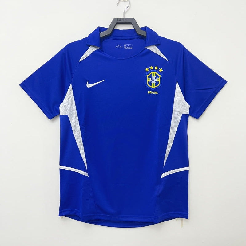 Brazil Away Jersey 2002 front view in blue with white side accents and Brazil crest