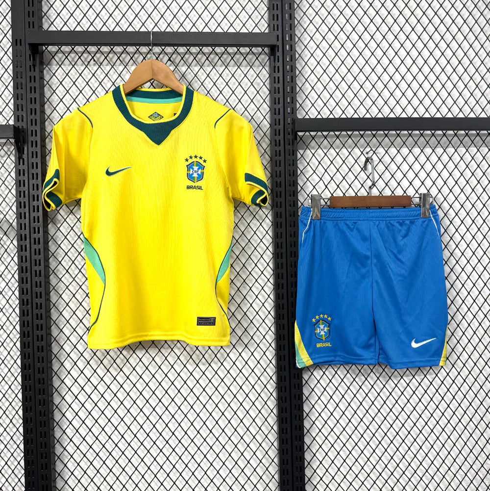Brazil Home 2026 Kids Set front view with yellow jersey and blue shorts