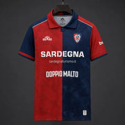 Cagliari Home Jersey 2026/27 front view with red and navy split design, geometric pattern, club crest and sponsor graphics