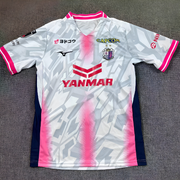 Cerezo Osaka Away Jersey 2026/27 front view in light grey with pink accents, club crest and Yanmar sponsor