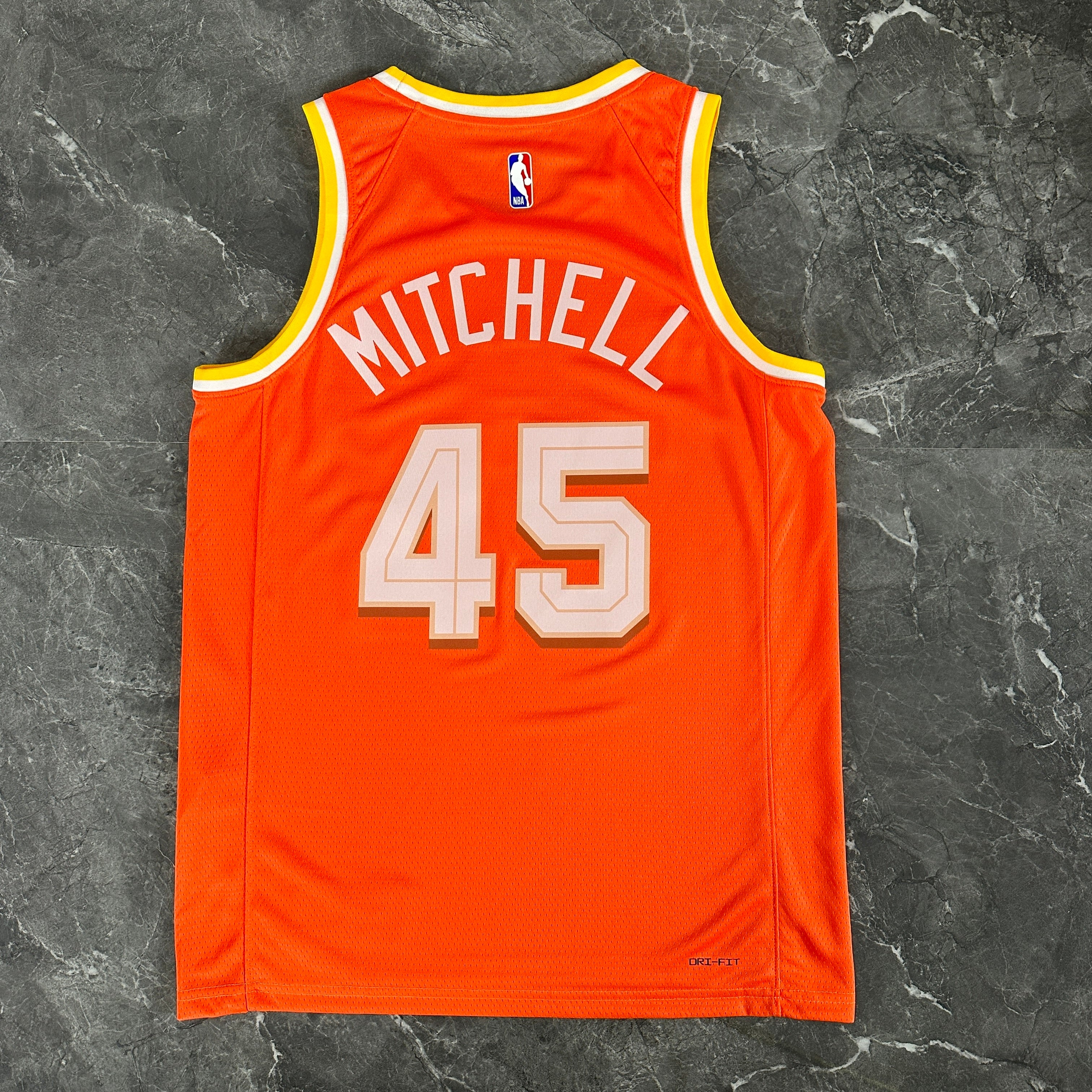 Cleveland Cavaliers 2025/26 City Edition youth jersey Donovan Mitchell number 45 orange The Land back view