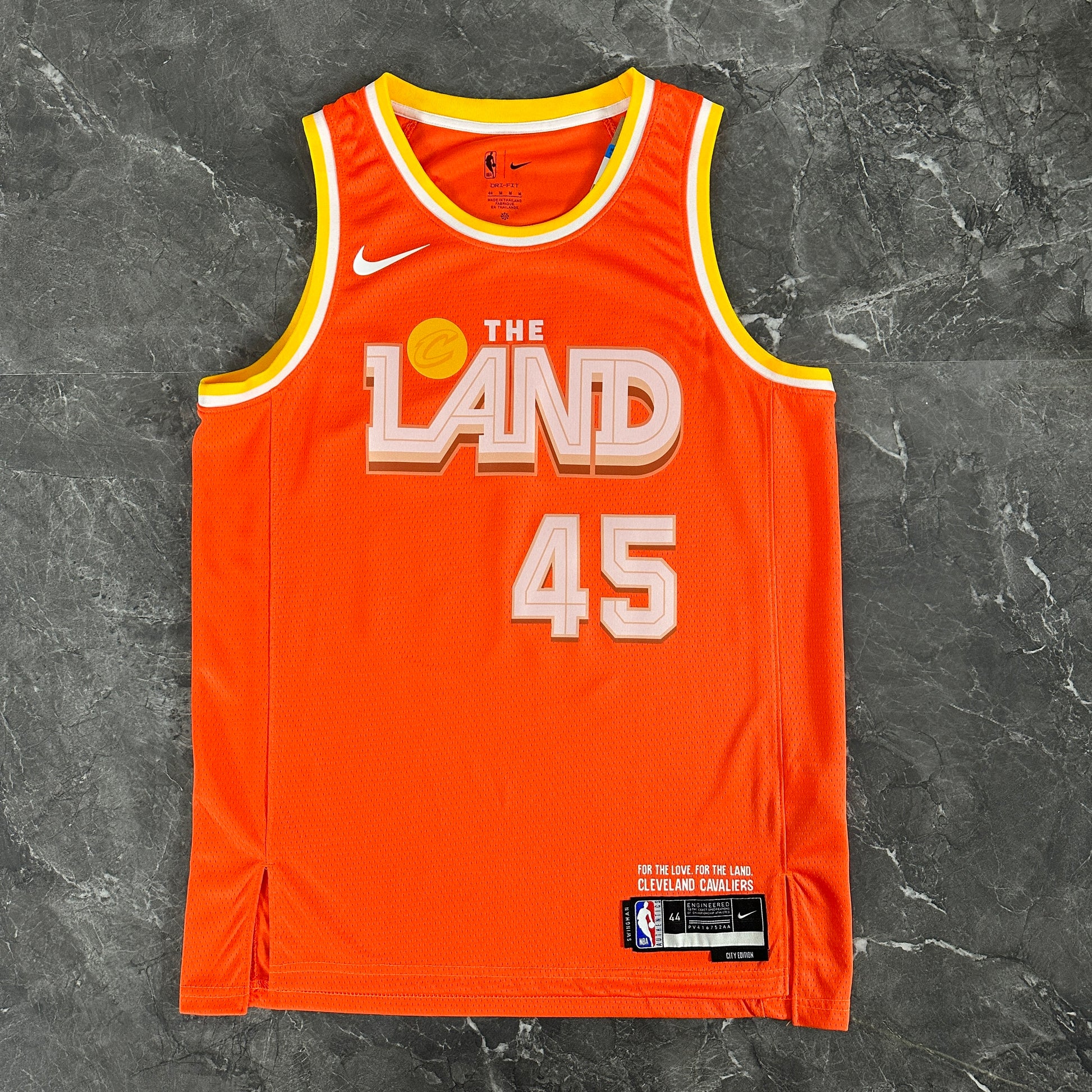 Cleveland Cavaliers 2025/26 City Edition youth jersey Donovan Mitchell number 45 orange The Land front view