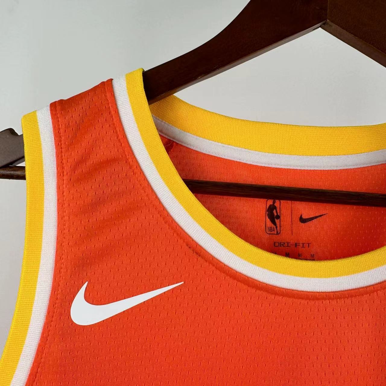 Cleveland Cavaliers 2025/26 City Edition youth jersey Donovan Mitchell number 45 orange The Land front view