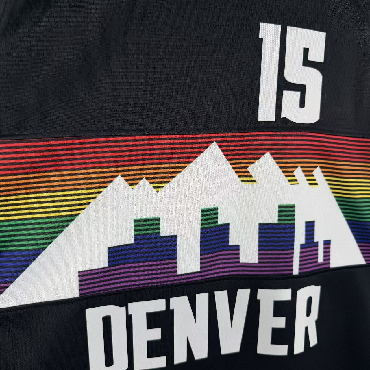Denver Nuggets 2025/26 City Edition Nikola Jokic jersey number 15 rainbow skyline front view