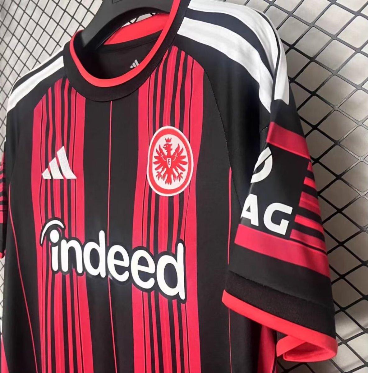 Eintracht Frankfurt Home Jersey 2026/27 angled view with Adidas stripes and sleeve detail