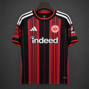 Eintracht Frankfurt Home Jersey 2026/27 front view with black and red vertical stripes