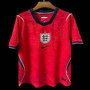 England 2026 World Cup away jersey red football shirt front view
