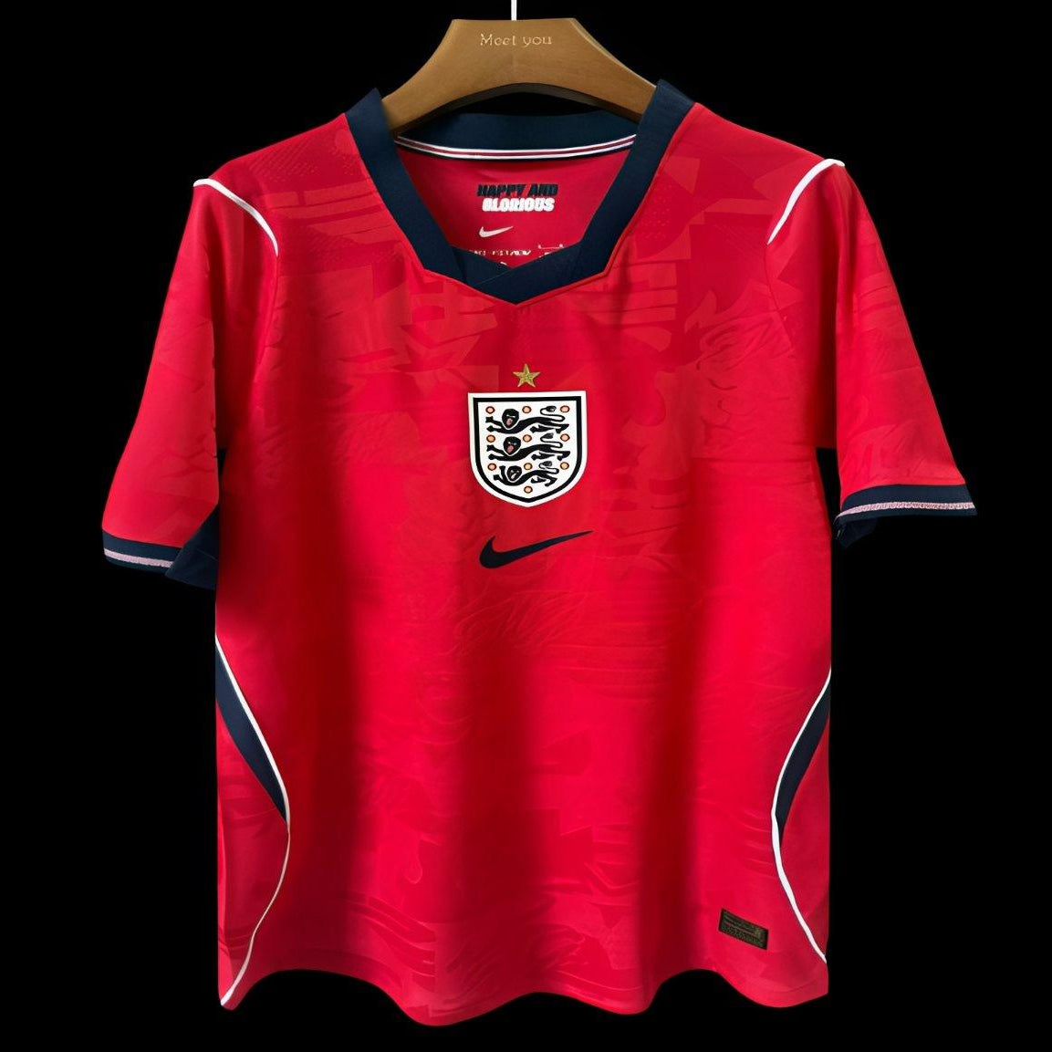 England 2026 World Cup away jersey red football shirt front view
