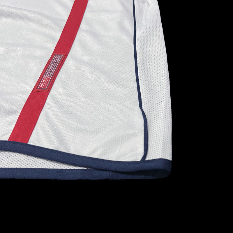 England Home Jersey 2002 side stripe detail with red and navy accents