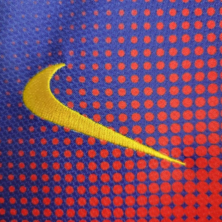 Nike logo detail on FC Barcelona 2012 13 home shirt
