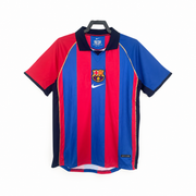 FC Barcelona Home Jersey 2001/02 front view with red and blue vertical stripes, dark collar, central club crest and white swoosh