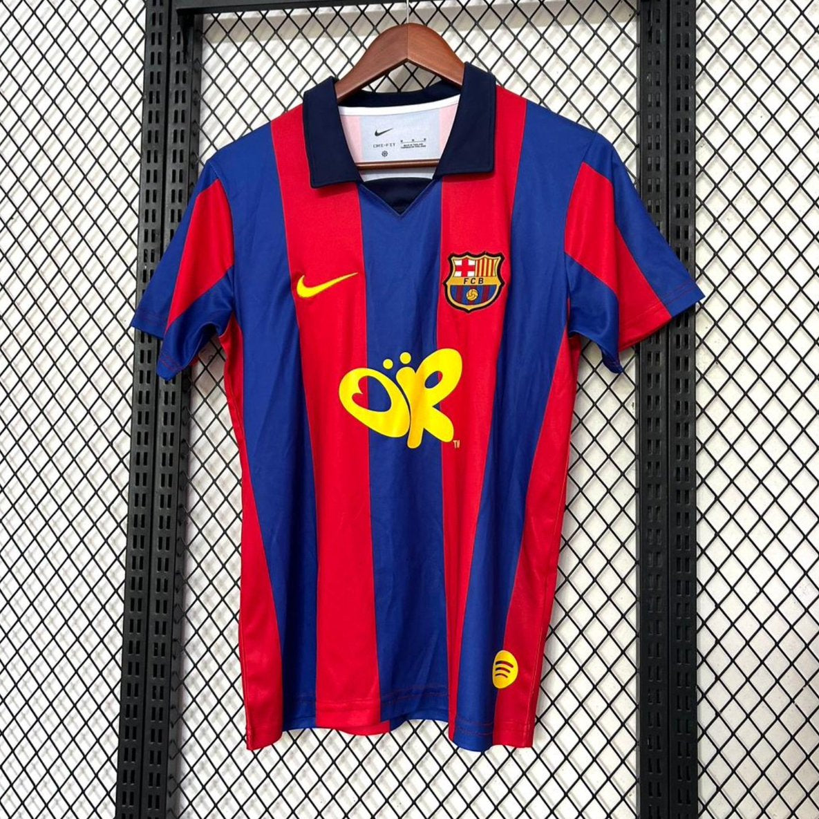FC Barcelona x Olivia Rodrigo 2003/04 jersey front view with red and blue stripes