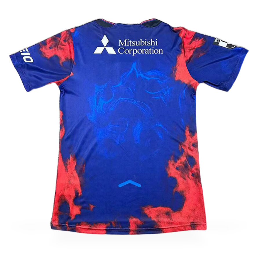 FC Tokyo Home Jersey 2026/27 back view in deep blue with red graphic accents, Mitsubishi Corporation sponsor and tonal centre graphic