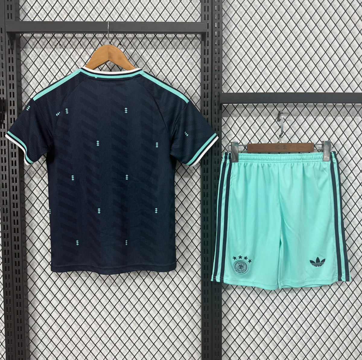 Germany Away Kit 2026/27 Kids Set back view with navy jersey and mint green shorts