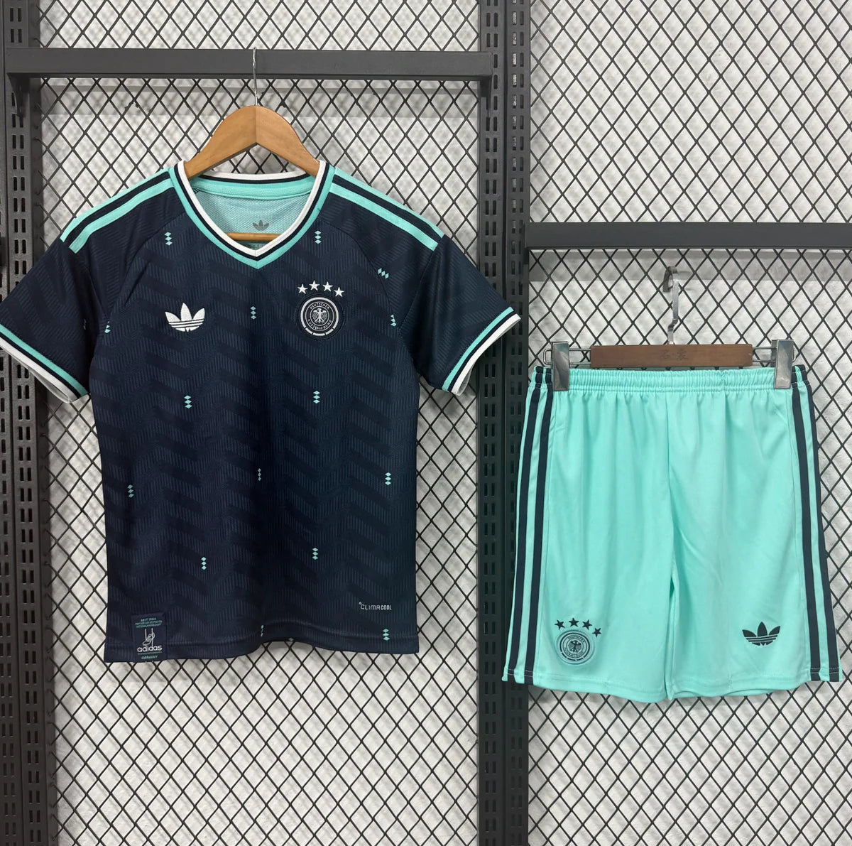 Germany Away Kit 2026/27 Kids Set front view with navy jersey and mint green shorts