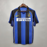 Inter Milan Home Jersey 2001/02 front view with black and blue vertical stripes and Pirelli sponsor