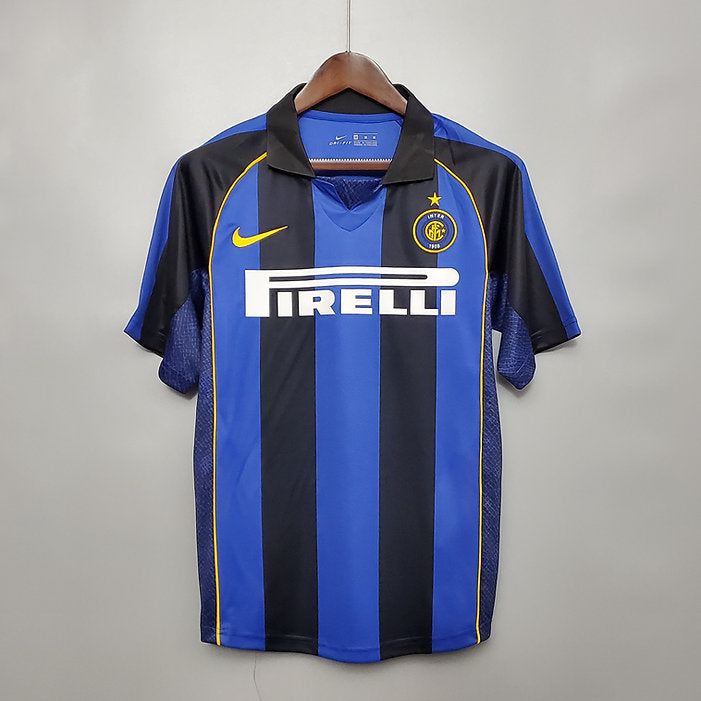 Inter Milan Home Jersey 2001/02 front view with black and blue vertical stripes and Pirelli sponsor