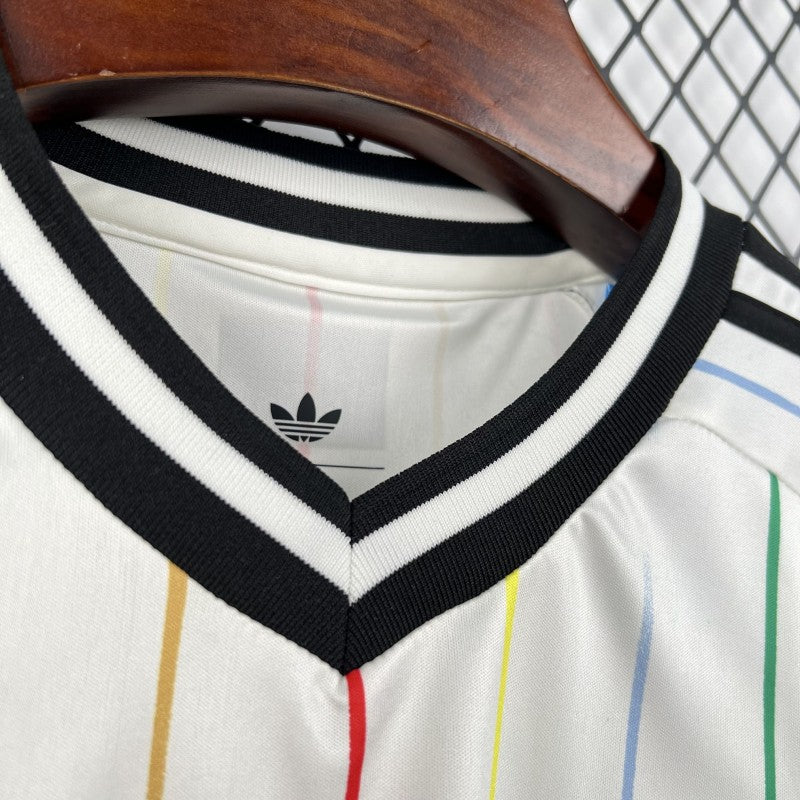 Japan Away Jersey 2026 collar close-up showing black V-neck trim and front stripe placement