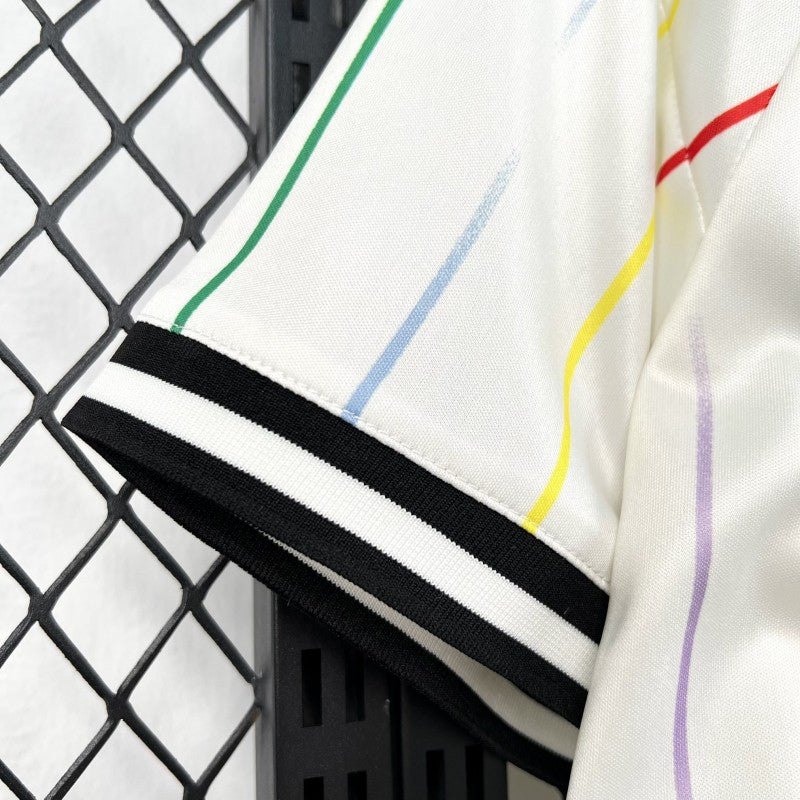 Japan Away Jersey 2026 sleeve detail showing multicolour stripe accents and cuff trim