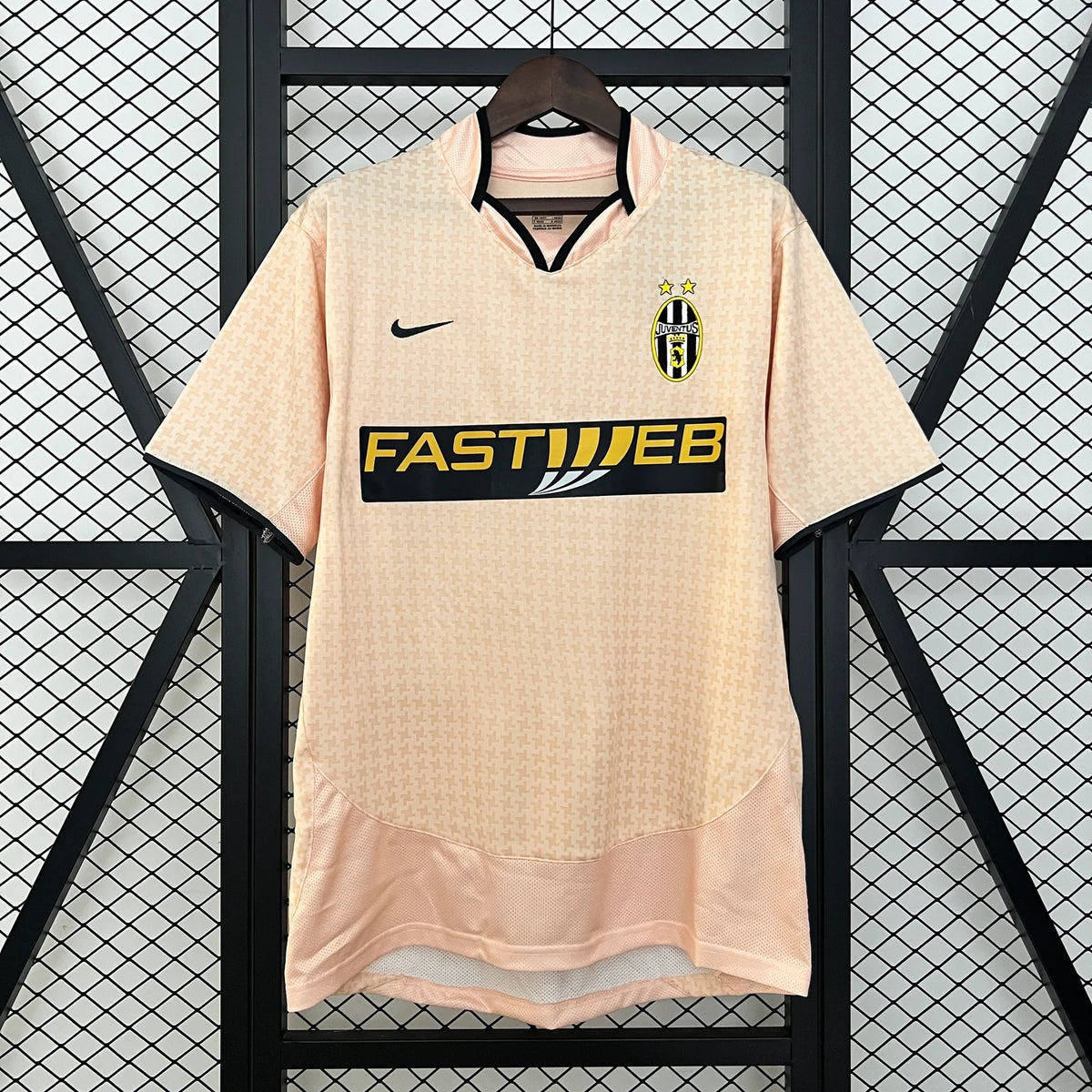 Juventus Away Jersey 2003/04 front view with pale pink design, Juventus crest, two stars and FASTWEB sponsor