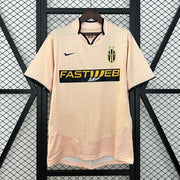 Juventus Away Jersey 2003/04 front view with pale pink design, Juventus crest, two stars and FASTWEB sponsor