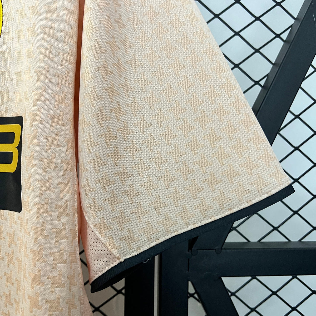 Juventus Away Jersey 2003/04 sleeve close-up showing the pale pink fabric and black cuff trim