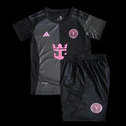 Kids Inter Miami 2025/26 away jersey black pink football kit front view
