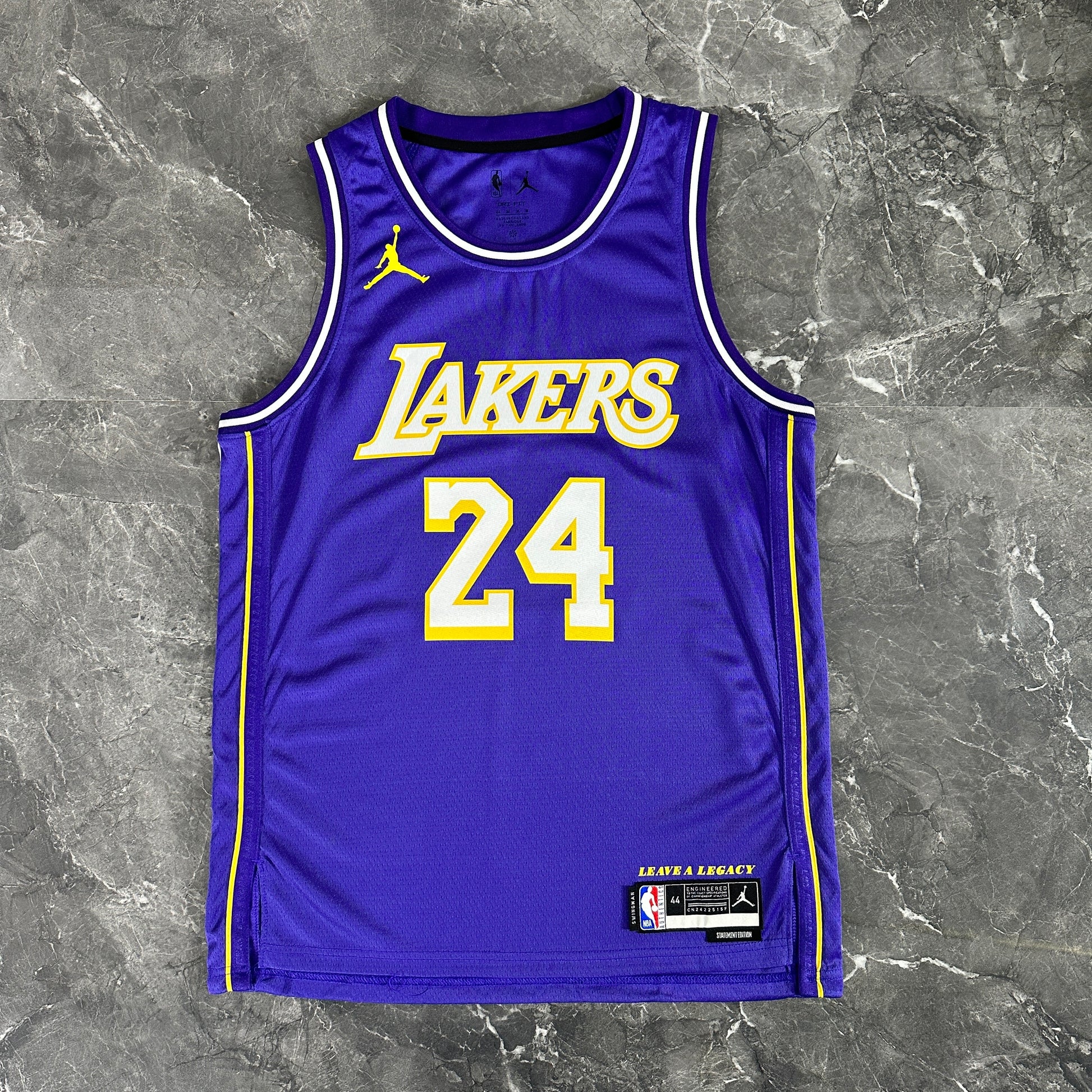 Los Angeles Lakers 2025/26 City Edition swingman jersey Kobe Bryant number 24 purple front and back view