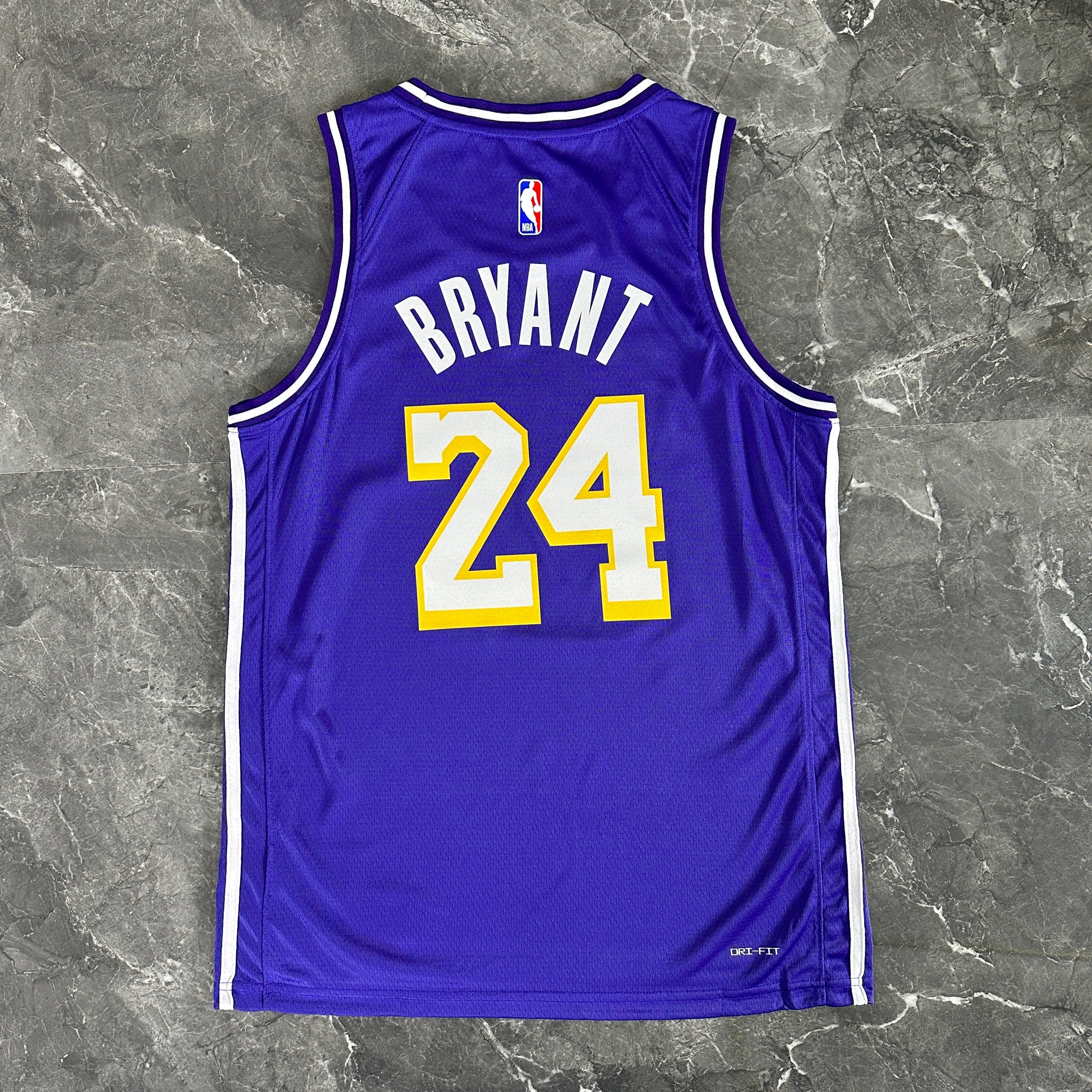 Los Angeles Lakers 2025/26 City Edition swingman jersey Kobe Bryant number 24 purple front and back view