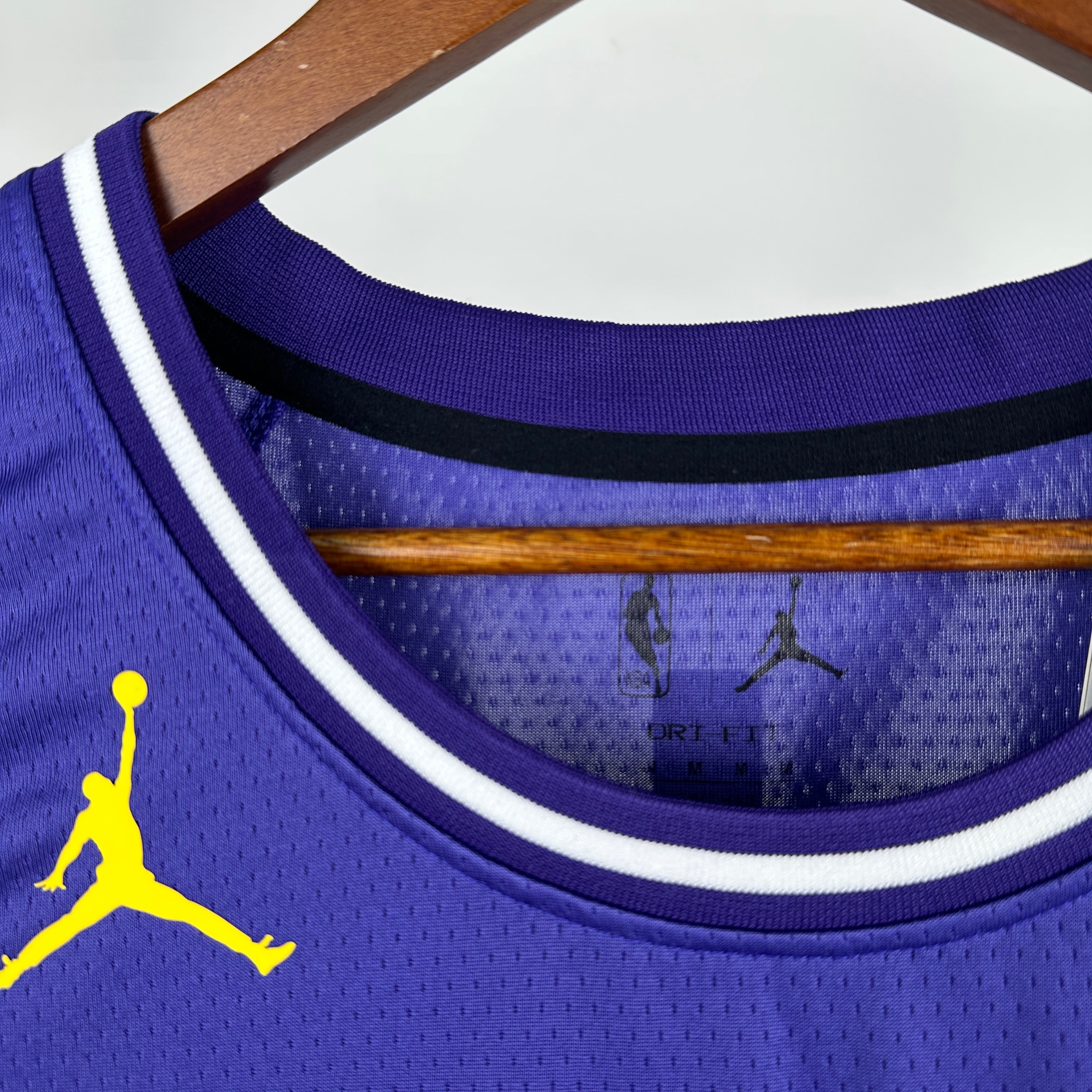 Los Angeles Lakers 2025/26 City Edition swingman jersey Kobe Bryant number 24 purple front and back view