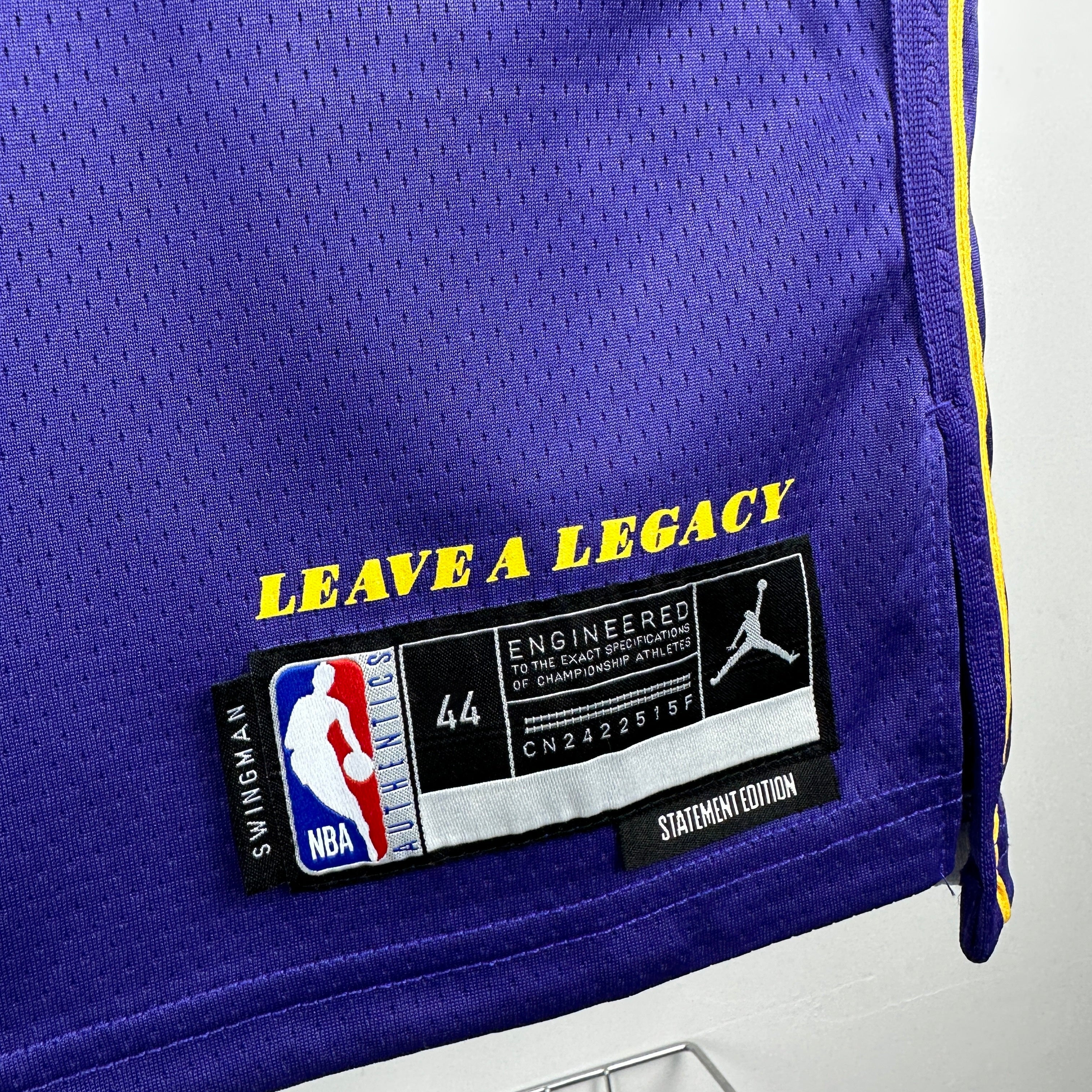 Los Angeles Lakers 2025/26 City Edition swingman jersey Kobe Bryant number 24 purple front and back view