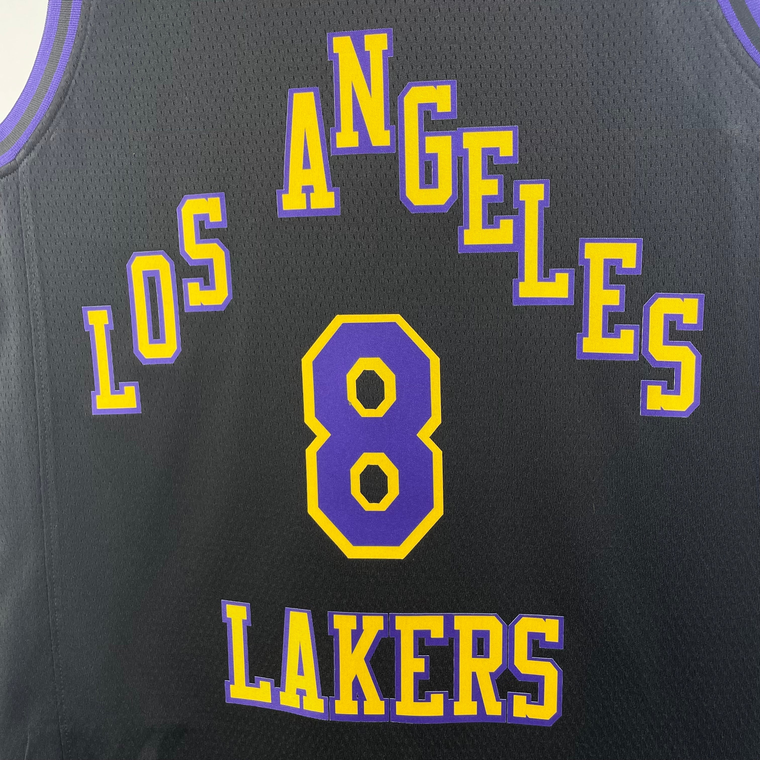 Los Angeles Lakers 2025/26 City Edition swingman jersey Kobe Bryant number 8 black purple gold front and back view