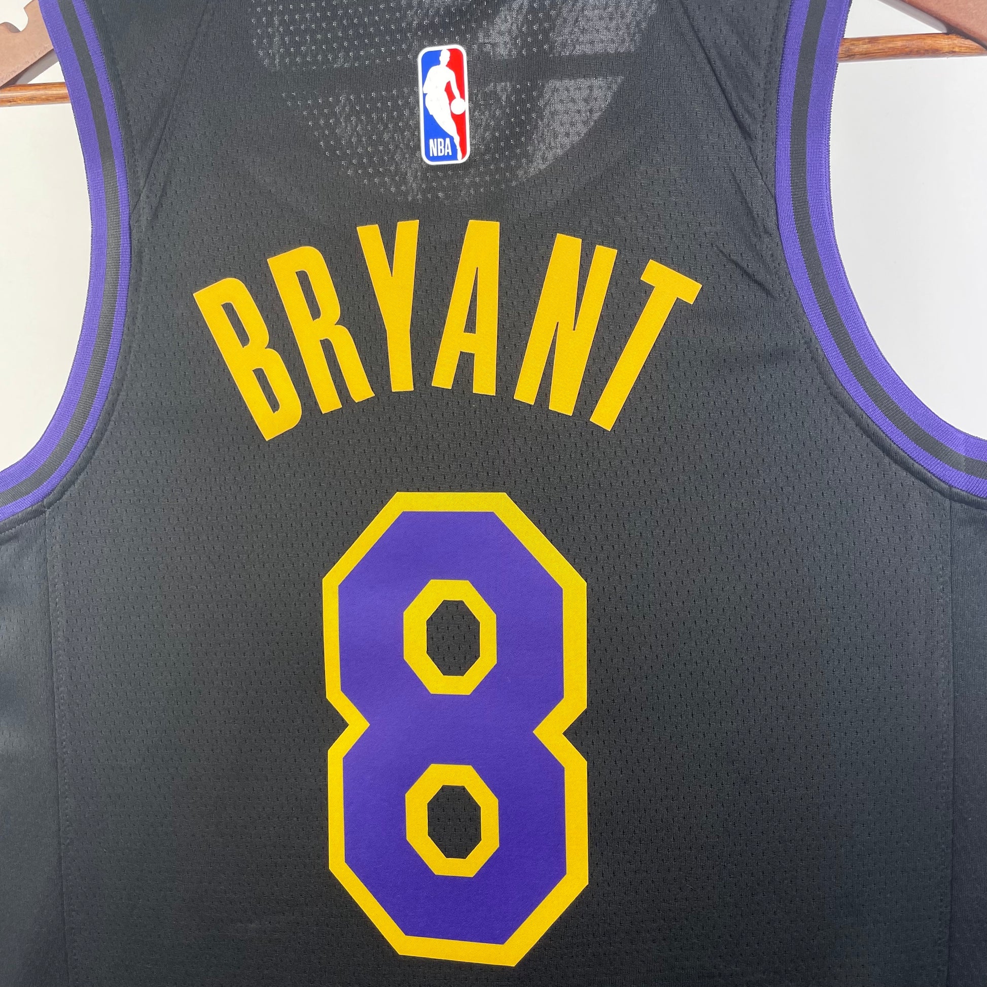 Los Angeles Lakers 2025/26 City Edition swingman jersey Kobe Bryant number 8 black purple gold front and back view