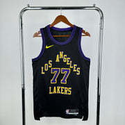 Los Angeles Lakers 2025/26 City Edition swingman jersey Luka Dončić number 77 black purple gold front and back view