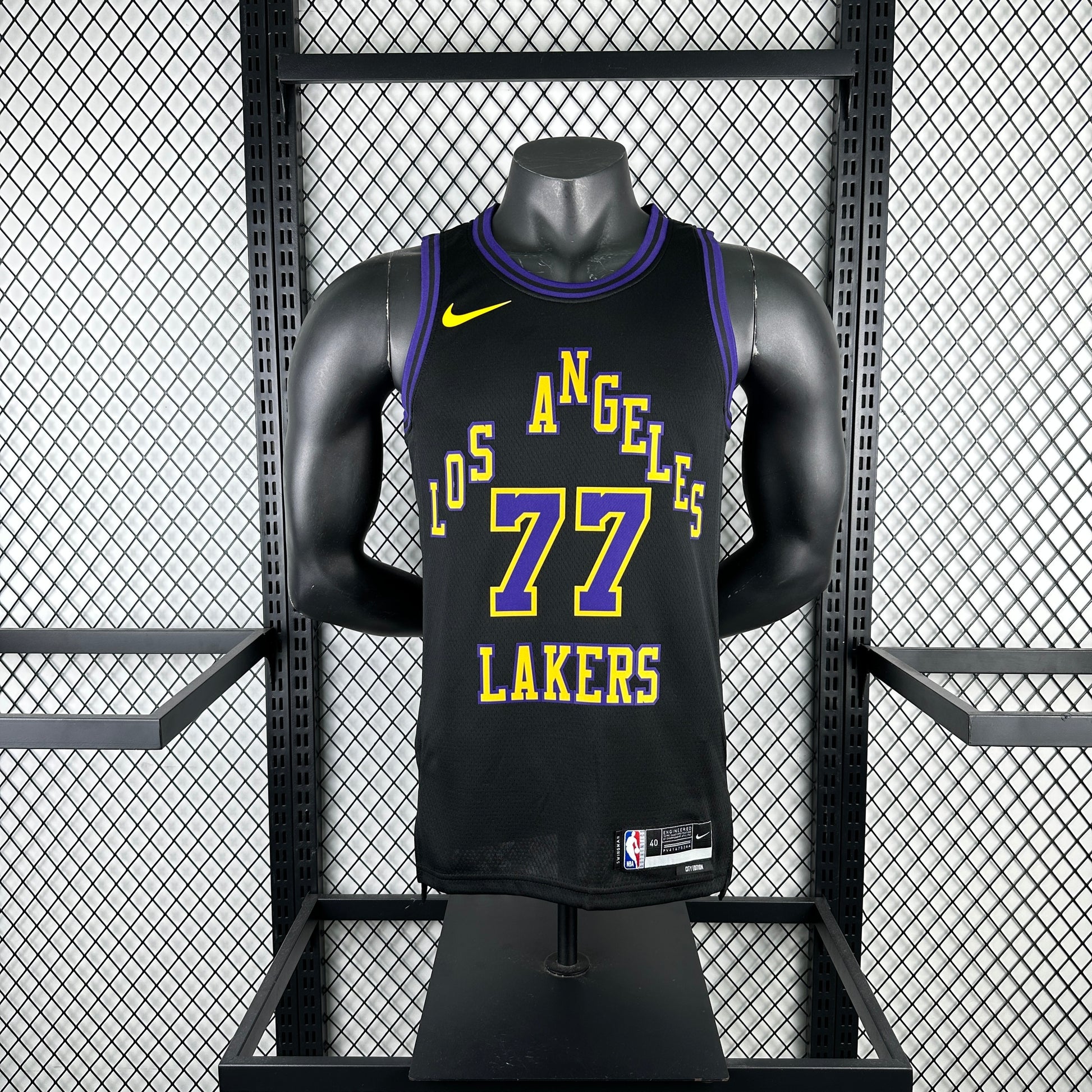 Los Angeles Lakers 2025/26 City Edition swingman jersey Luka Dončić number 77 black purple gold front and back view