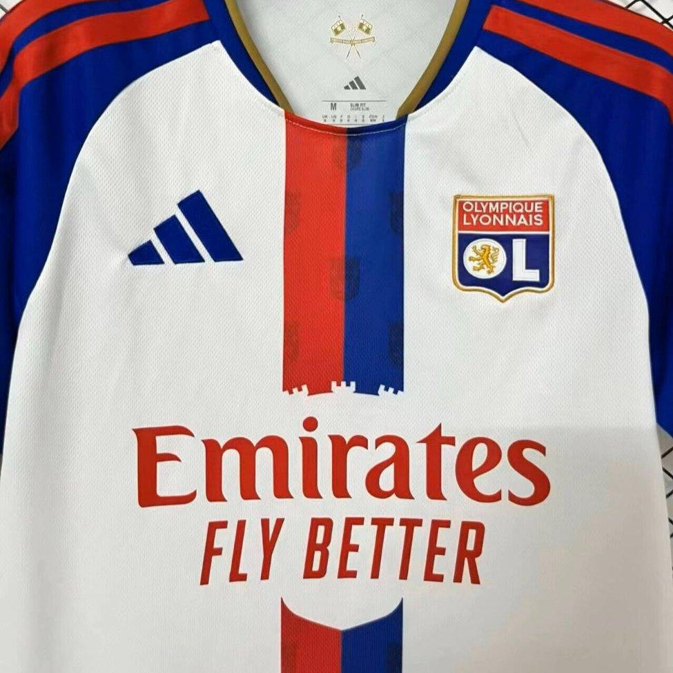 Lyon Home Jersey 2026/27 chest detail with club crest Adidas logo and Emirates Fly Better sponsor