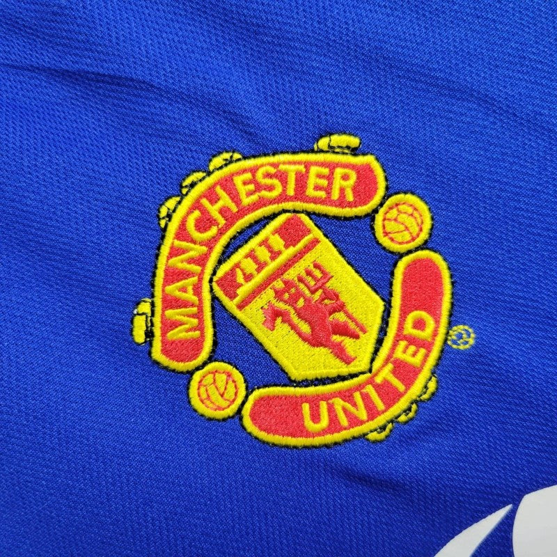 Manchester United crest close-up on the 2005/06 away jersey